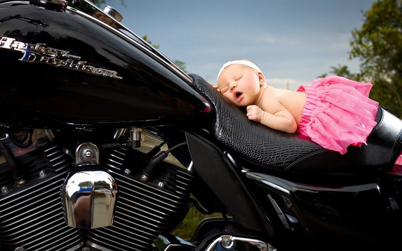 Baby Sleeping on Motorcycle