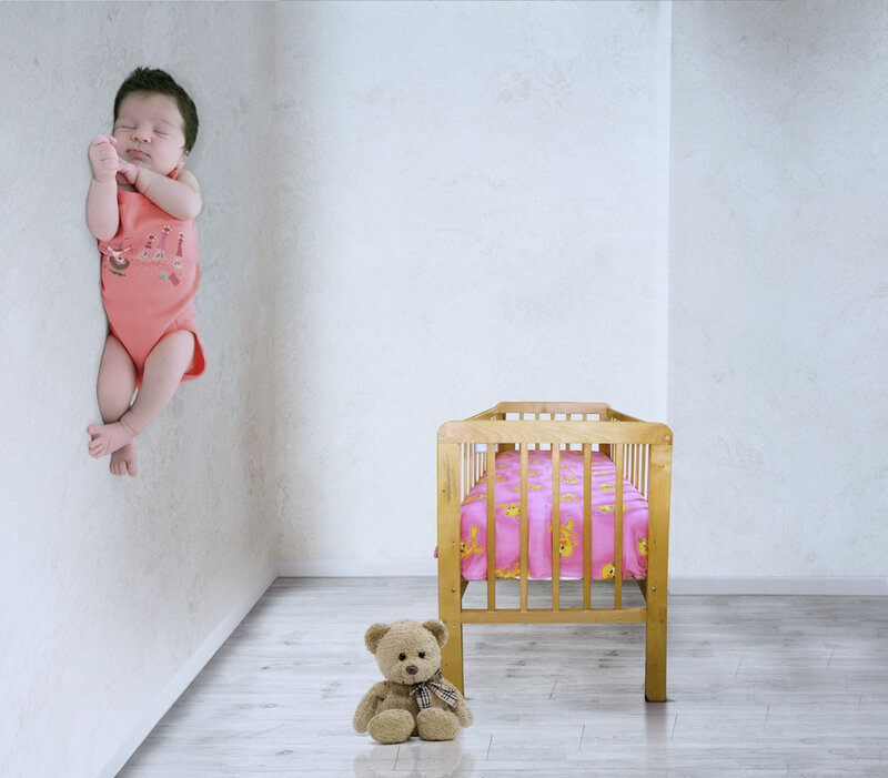 Baby Sleeping on Wall