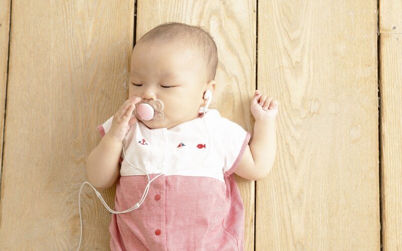 Baby sleeping with pacifier