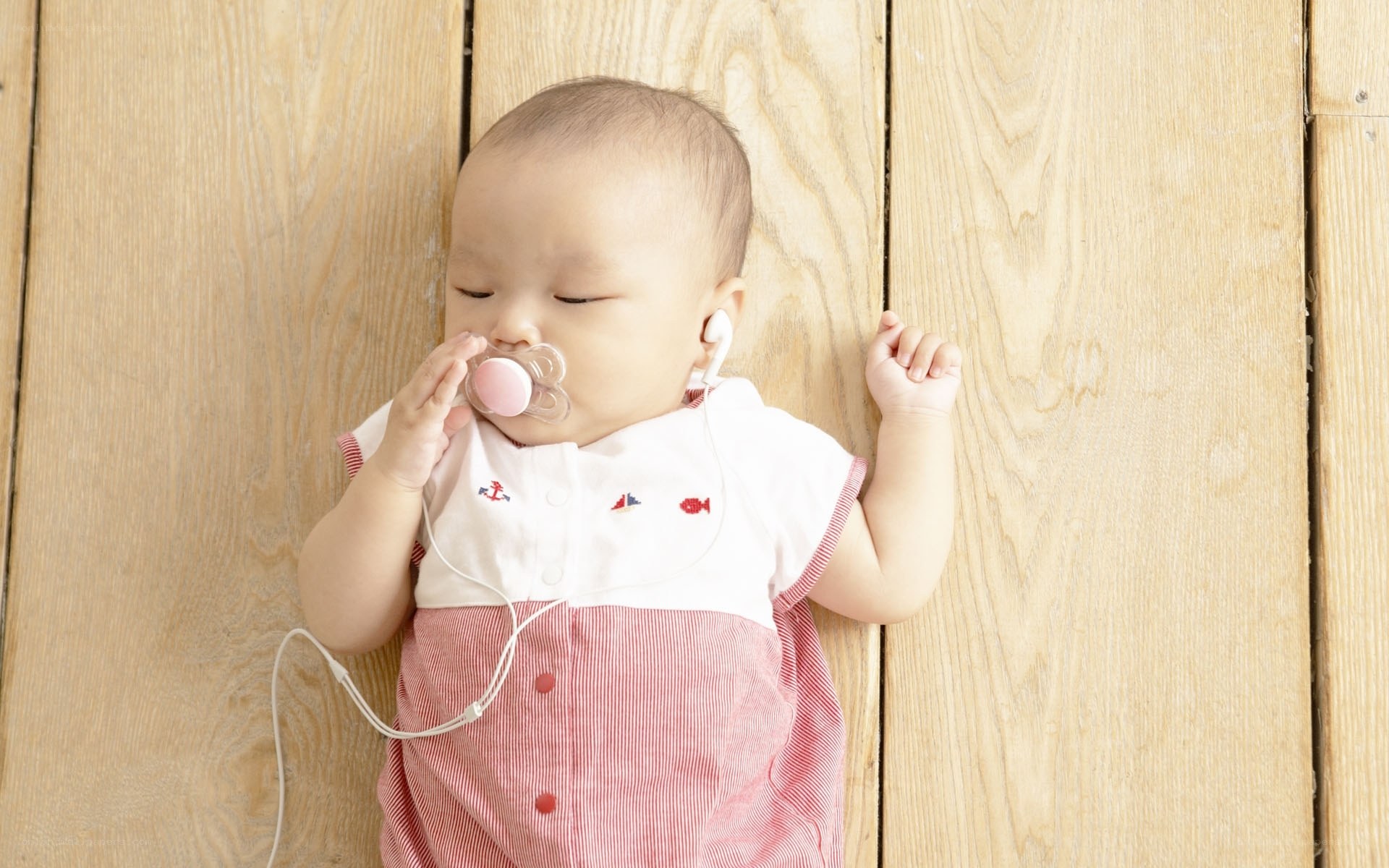 Baby sleeping with pacifier
