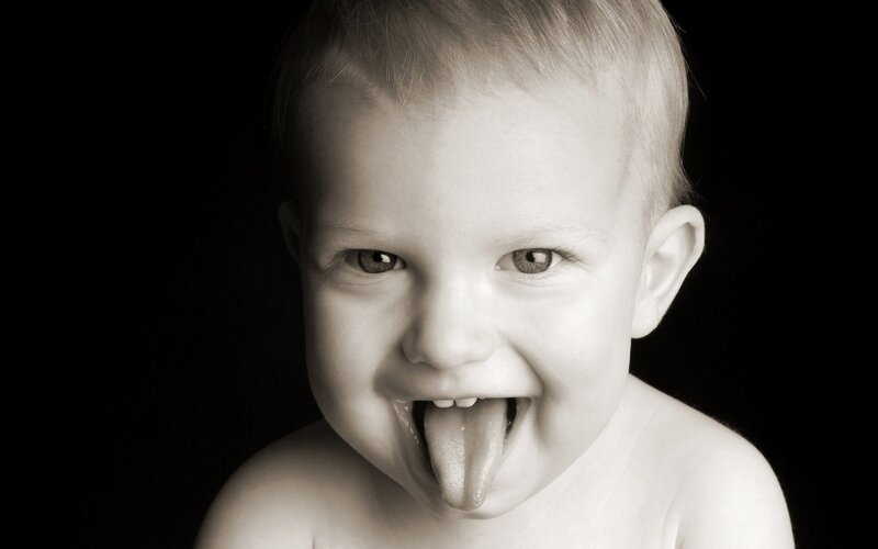 Baby sticking out tongue