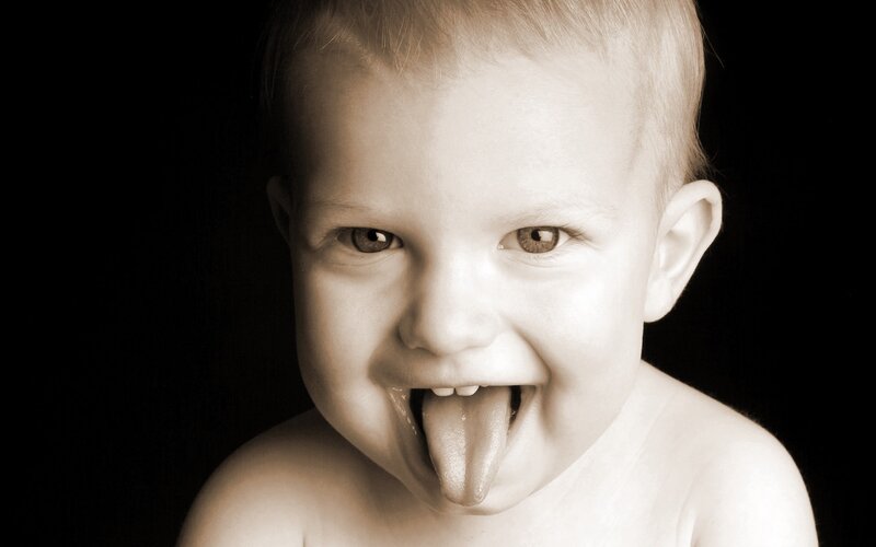 Baby sticking out tongue