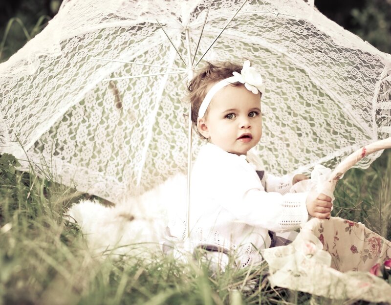 Baby under Lace Umbrella