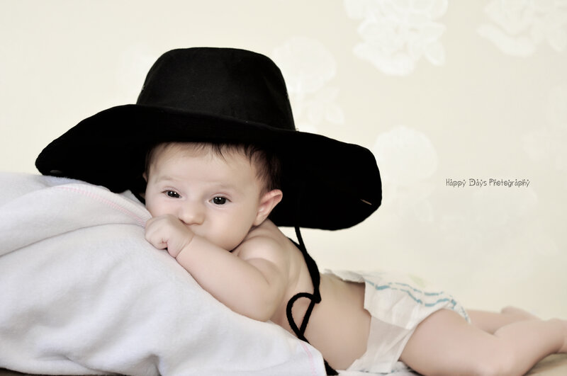 Baby Wearing Black Hat