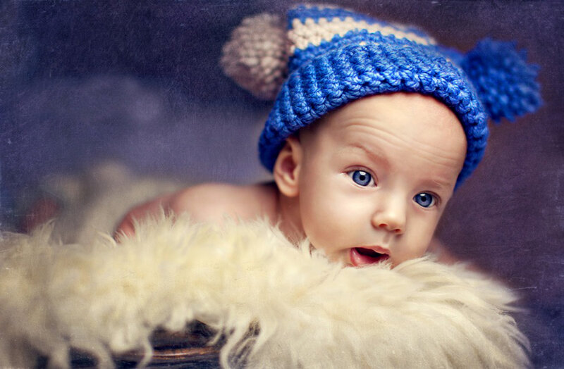 Baby Wearing Blue Hat