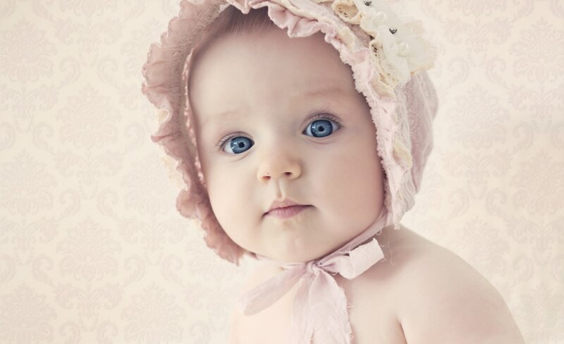Baby Wearing Bonnet — Pink