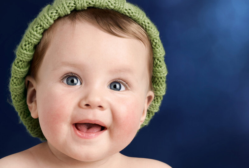 Baby Wearing Green Hat