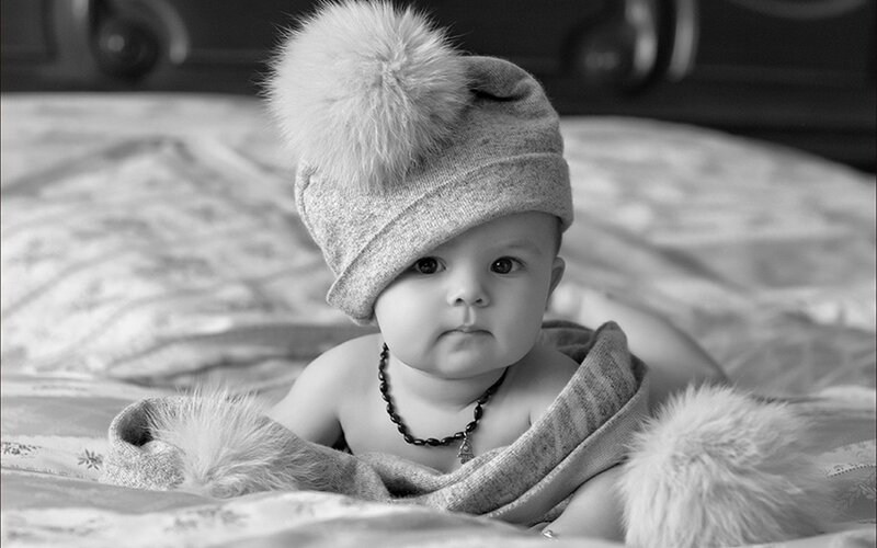 Baby Wearing Hat — Black, Calm