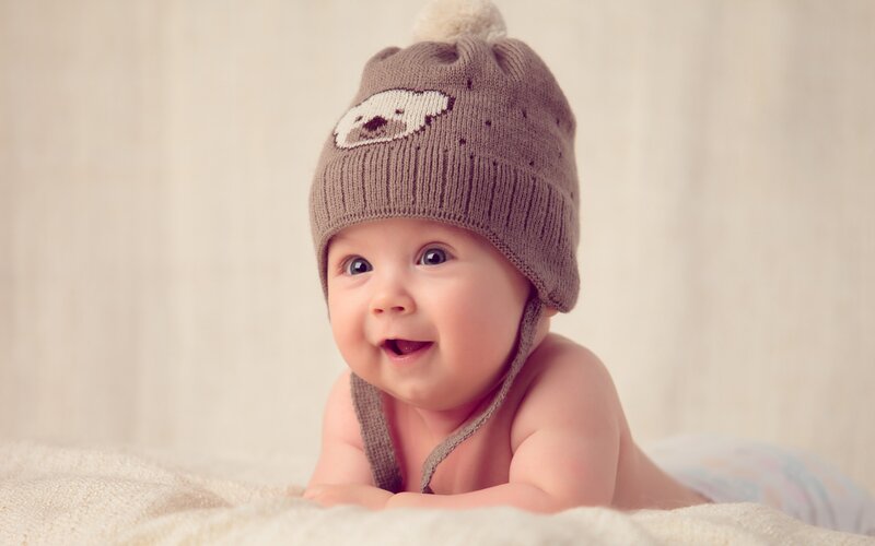 Baby Wearing Hat — Brown, Calm