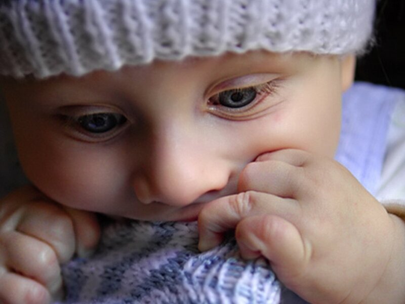Baby Wearing Hat — White, Calm