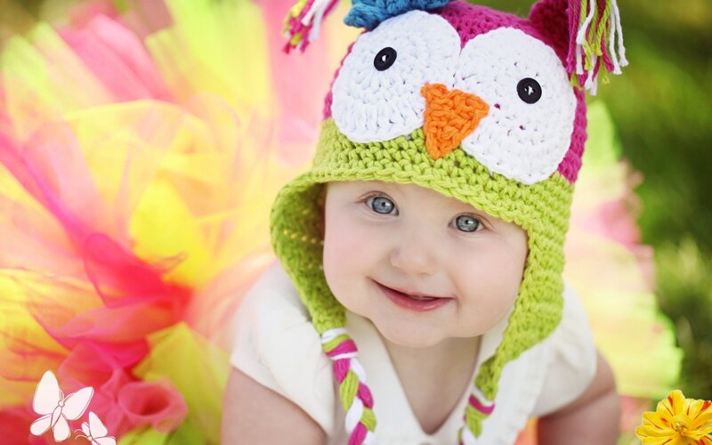 Baby Wearing Owl Hat