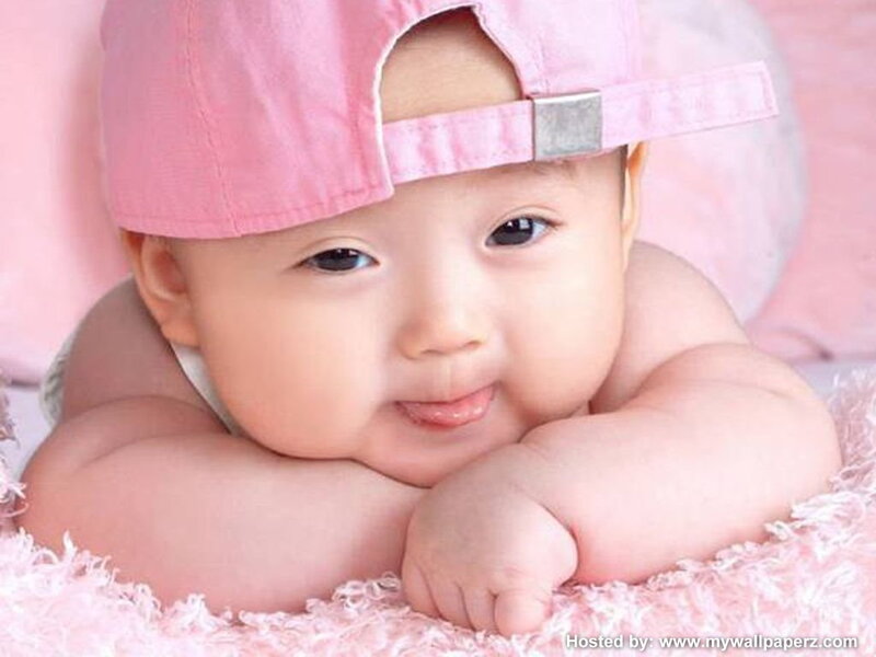 Baby Wearing Pink Hat — Calm, Photograph