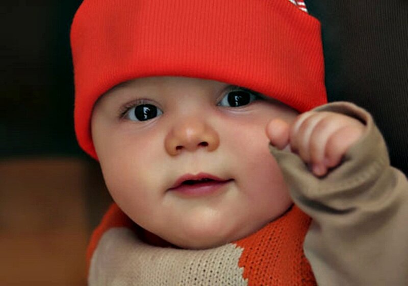Baby Wearing Red Hat