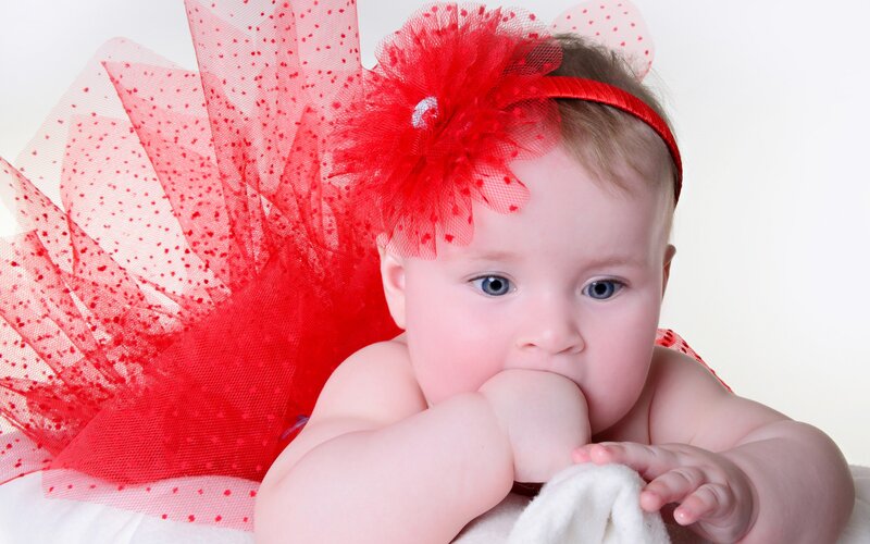 Baby Wearing Red Headband