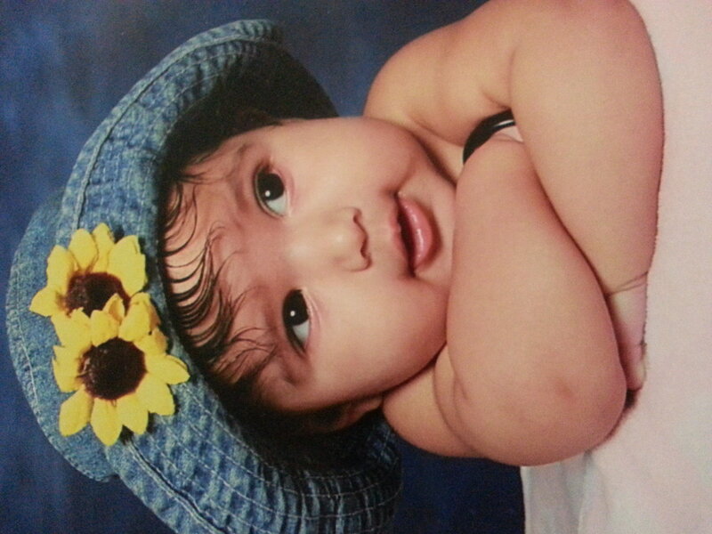 Baby Wearing Sunflower Hat