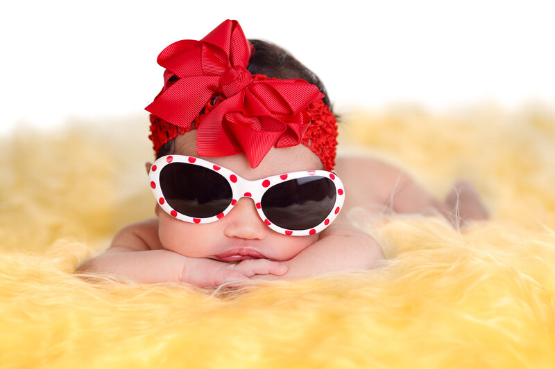 Baby Wearing Sunglasses — Red, Playful
