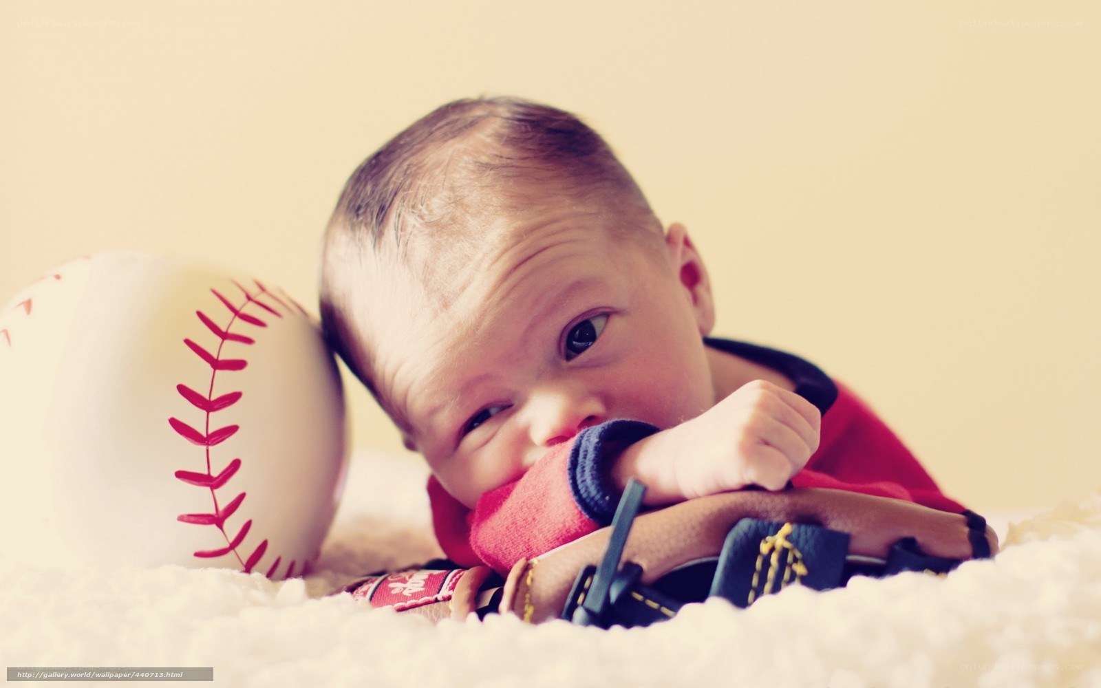 Baby with baseball and glove