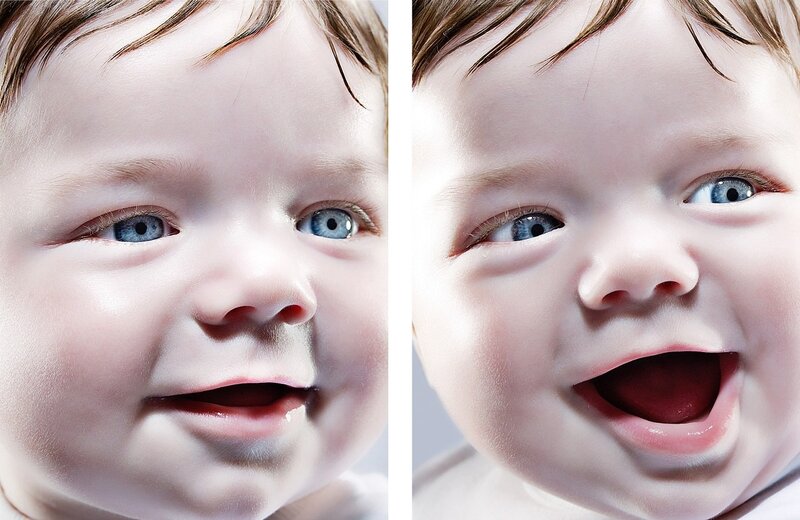 Baby with blue eyes smiling