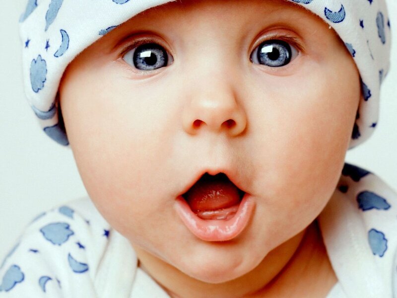 Baby with Blue Eyes — White, Surprised