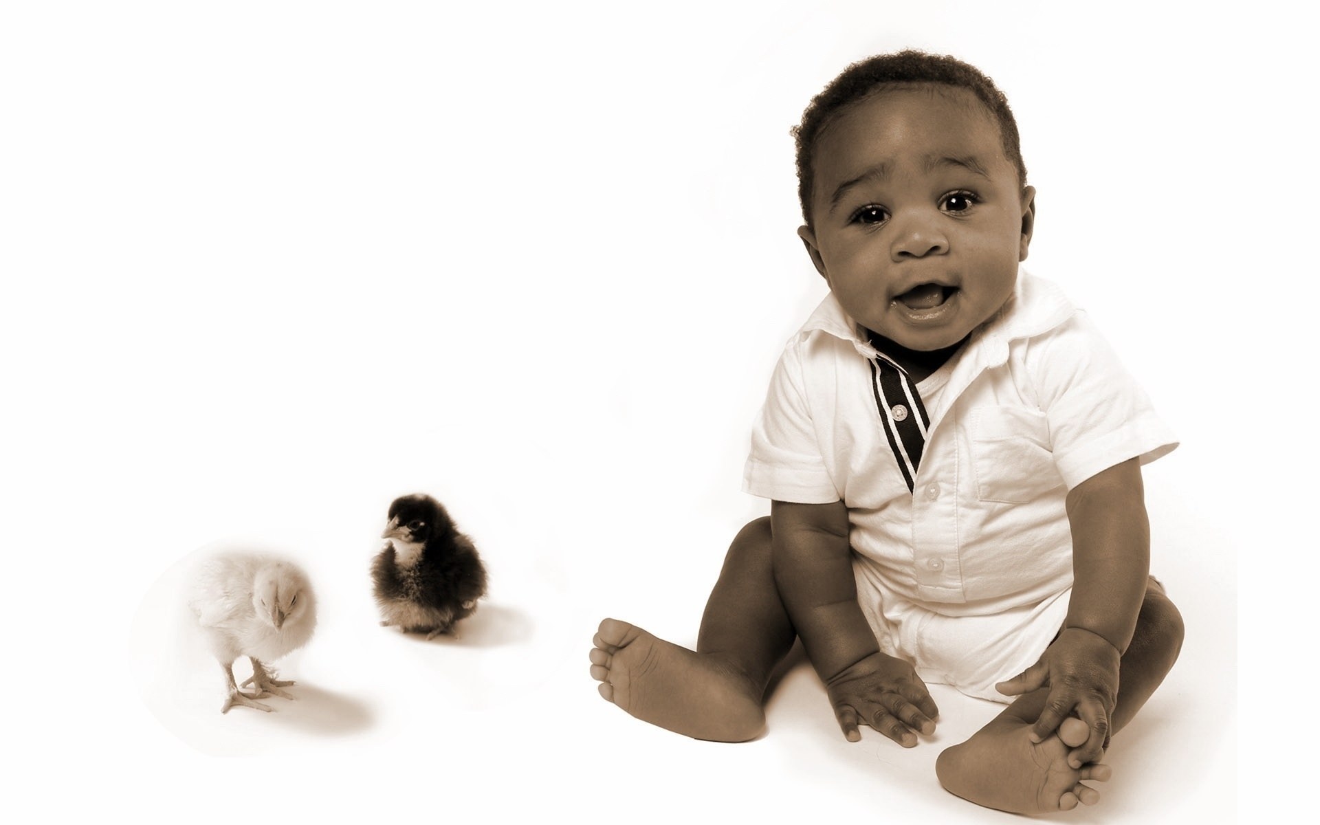 Baby with chicks on white