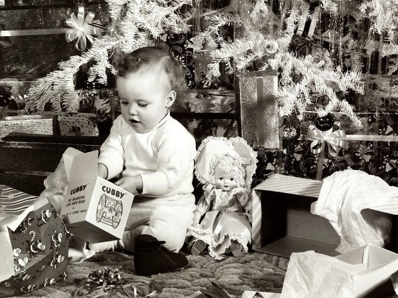 Baby with Christmas gifts