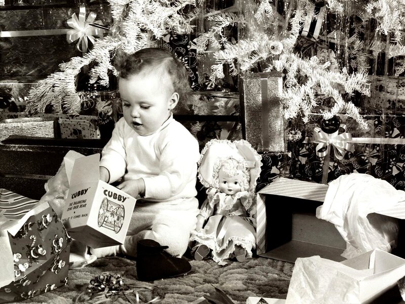 Baby with Christmas gifts