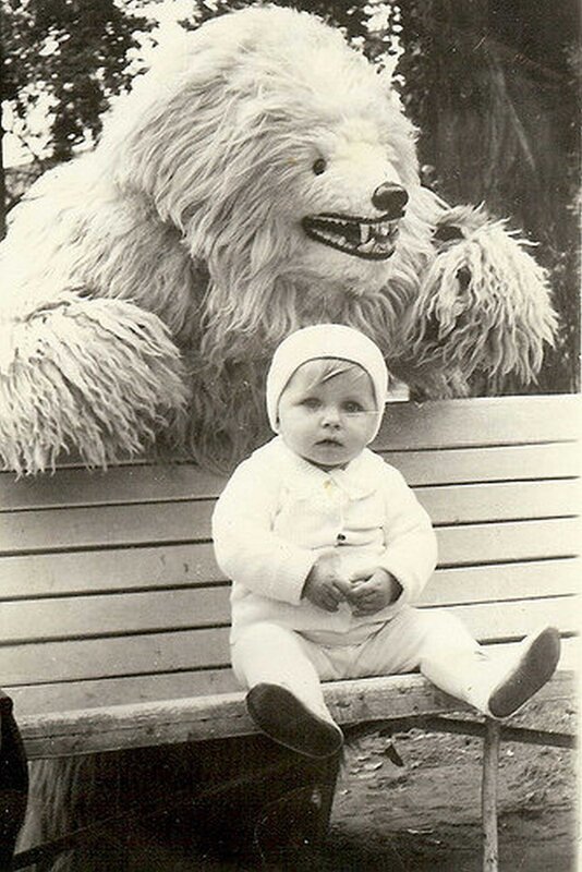 Baby with costumed bear