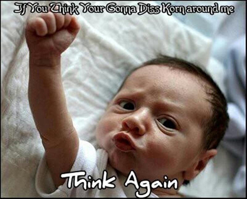 Baby with fist raised