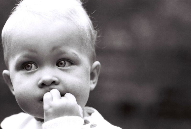 Baby with hand in mouth