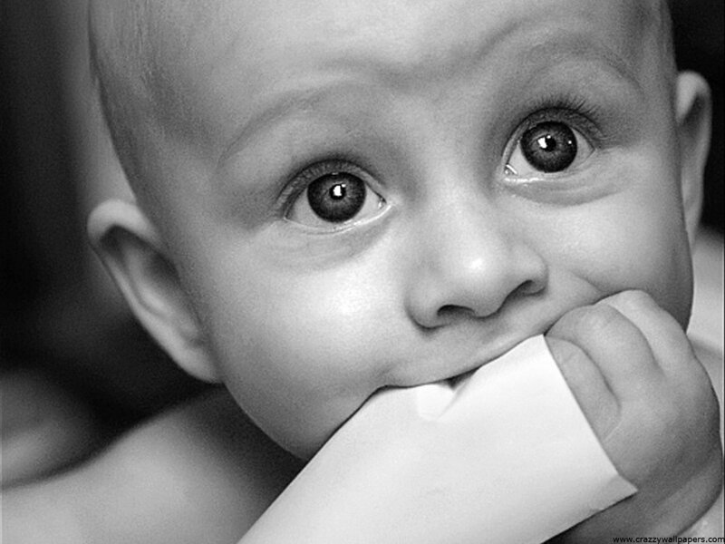 Baby with hand in mouth