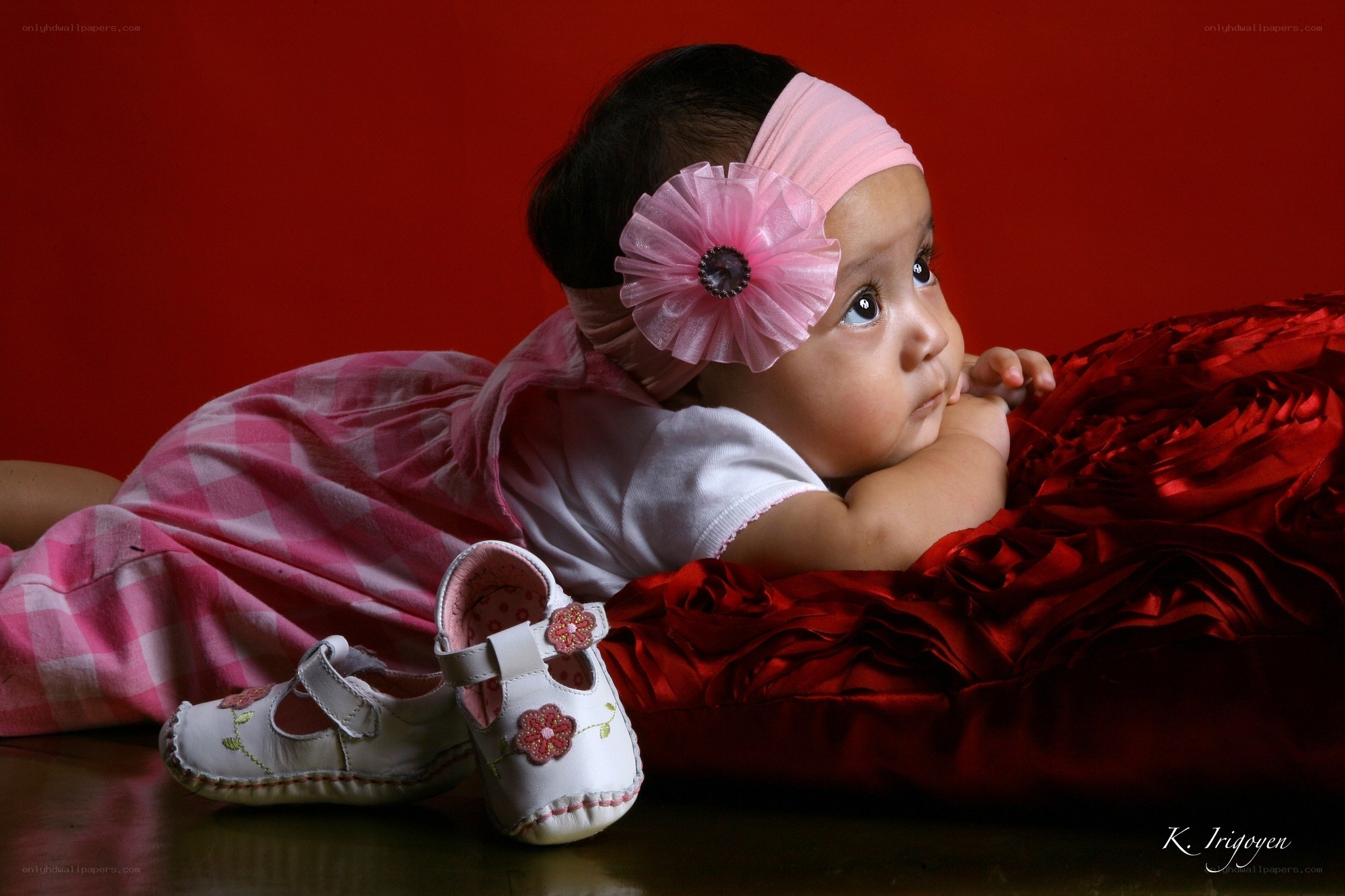 Baby with pink headband