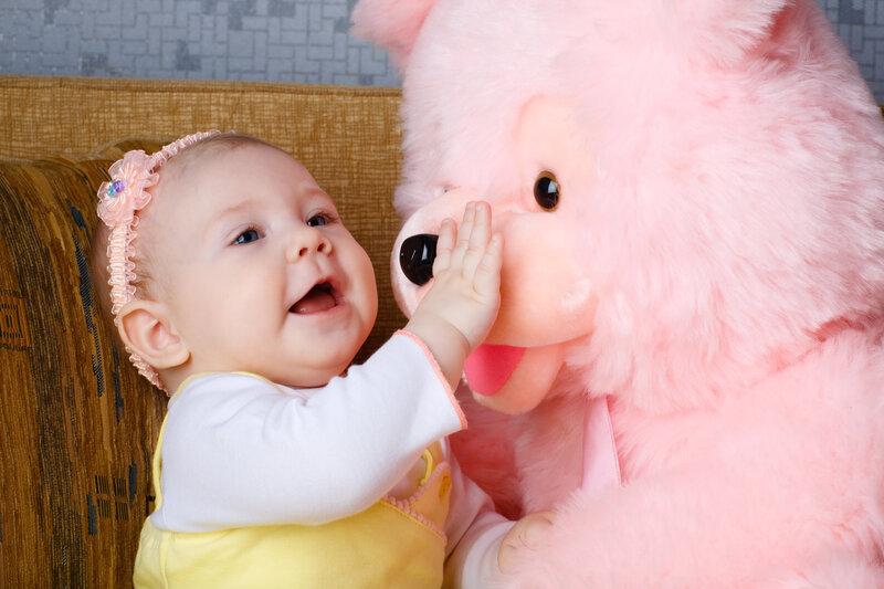Baby with Pink Teddy Bear — Playful
