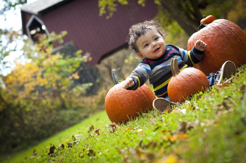 Baby with Pumpkins