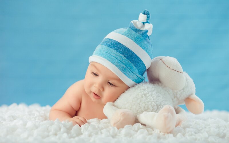 Baby with Stuffed Lamb