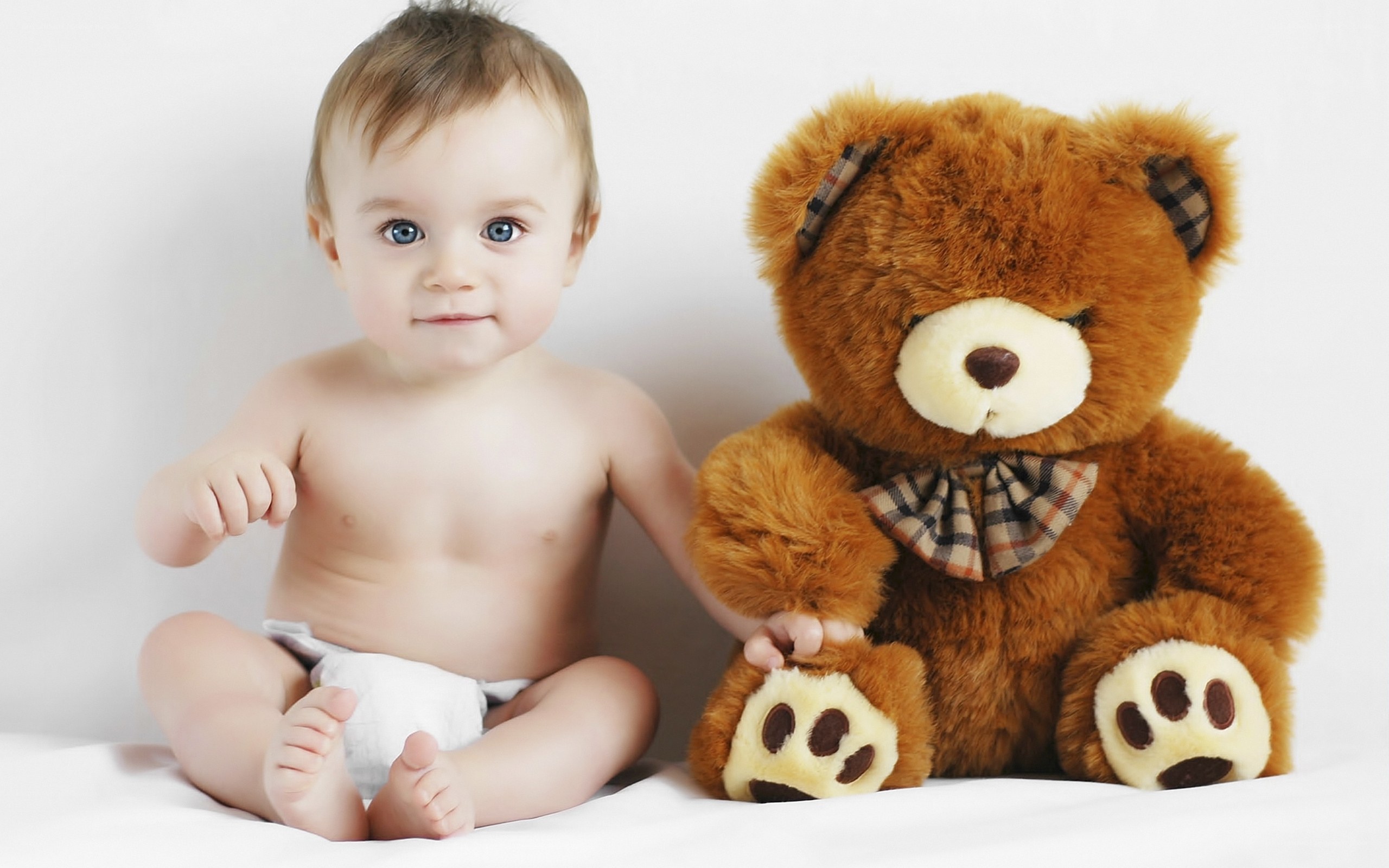 Baby with teddy bear