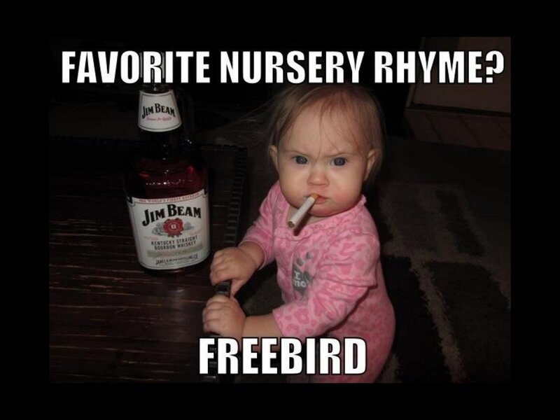 baby with whiskey bottle
