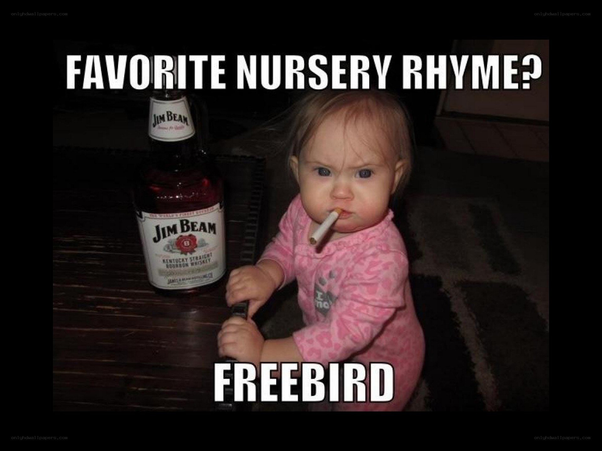 baby with whiskey bottle