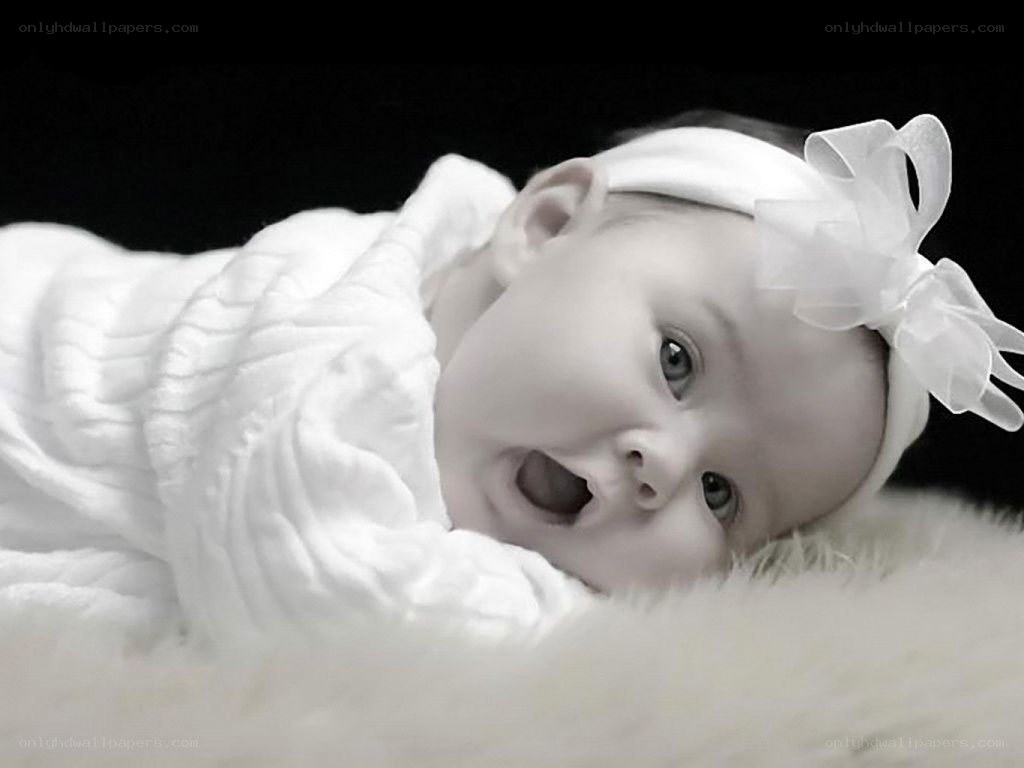 baby with white bow
