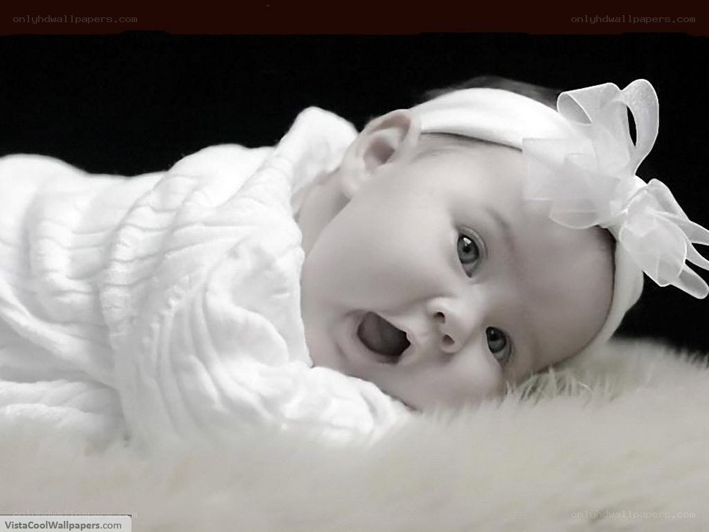 Baby with white bow
