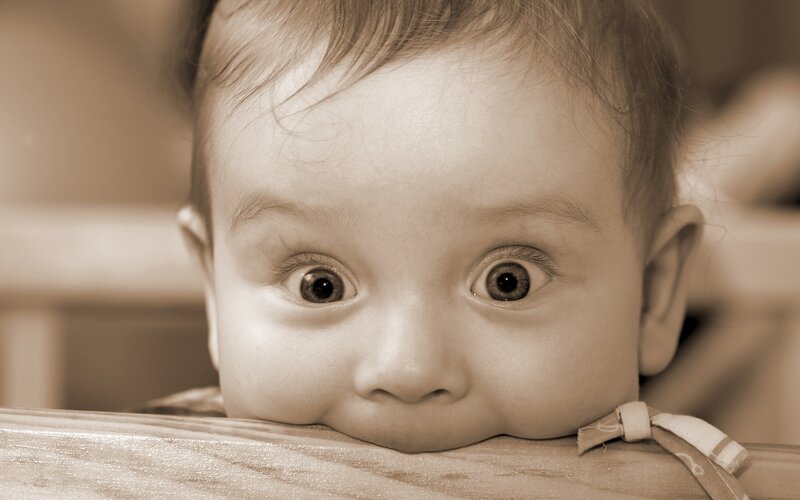 Baby with Wide Eyes — Sepia
