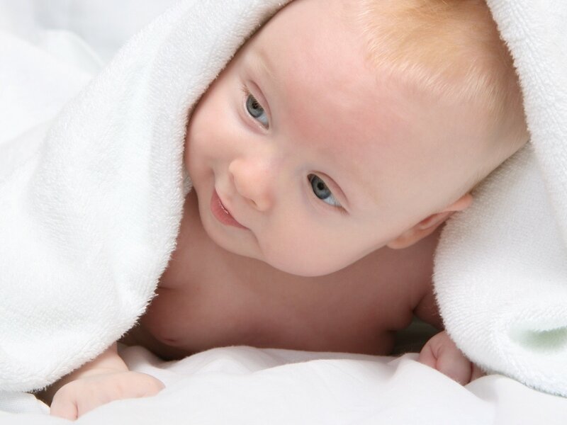 baby wrapped in a towel