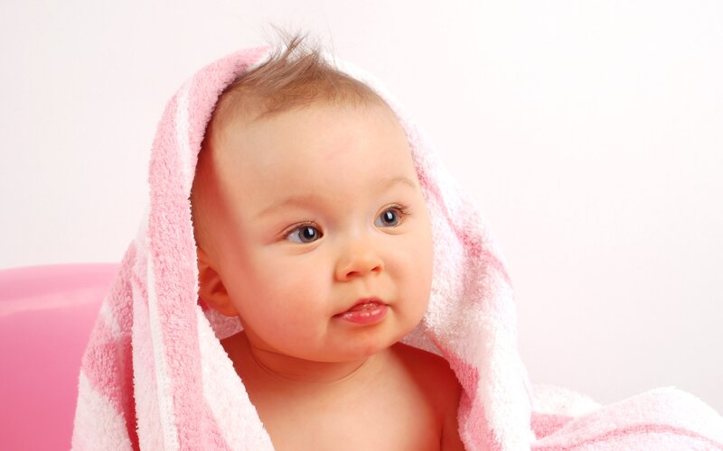 baby wrapped in towel