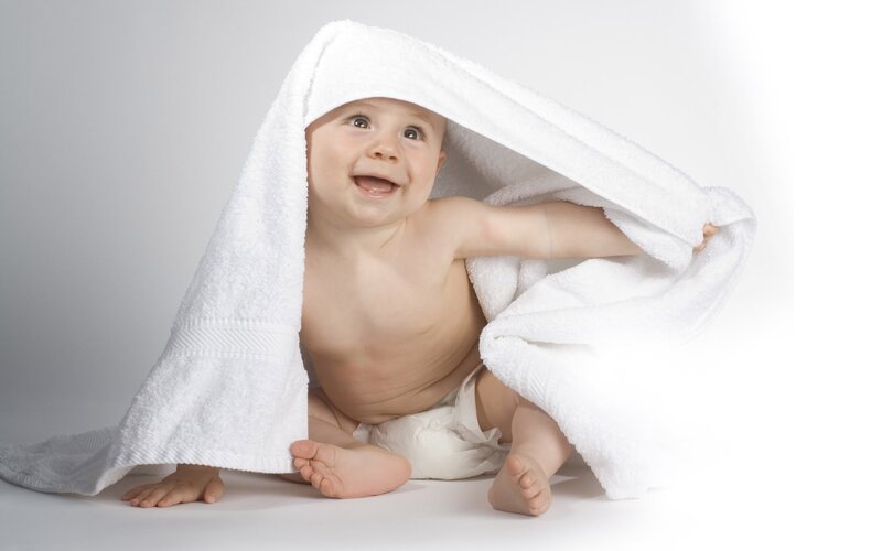 baby wrapped in towel