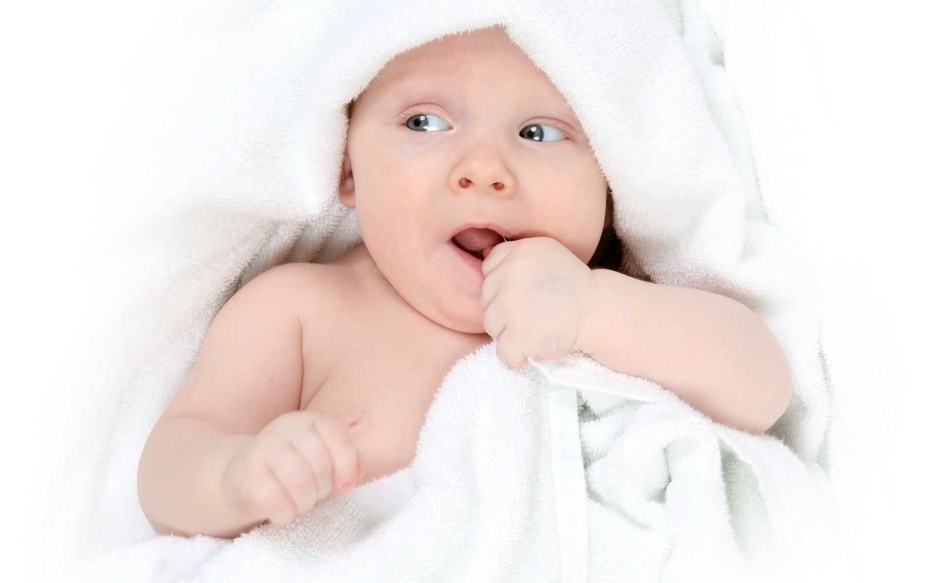 baby wrapped in towel