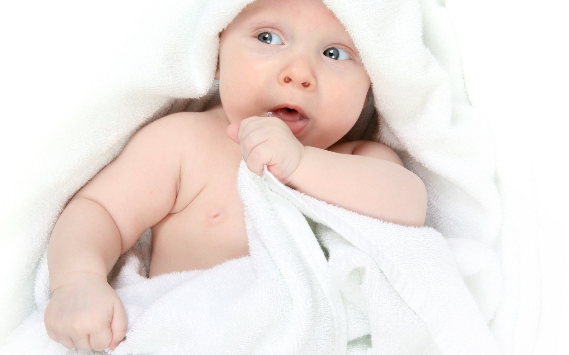 baby wrapped in towel