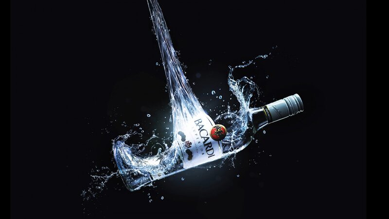 Bacardi Bottle in Water — Black, Dramatic, Photograph, Splash, White