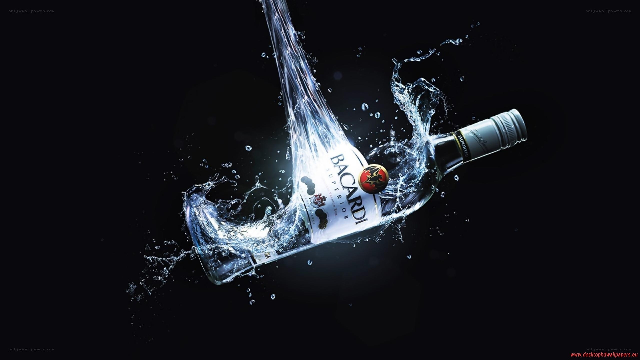 Bacardi bottle in water splash