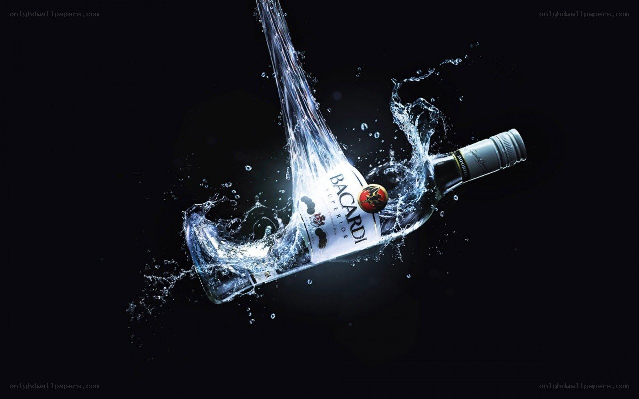 Bacardi bottle in water splash