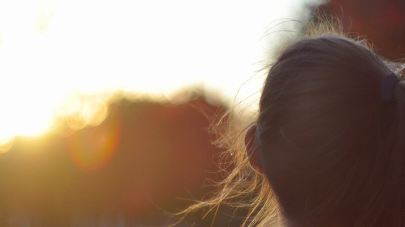 back of head in sunlight