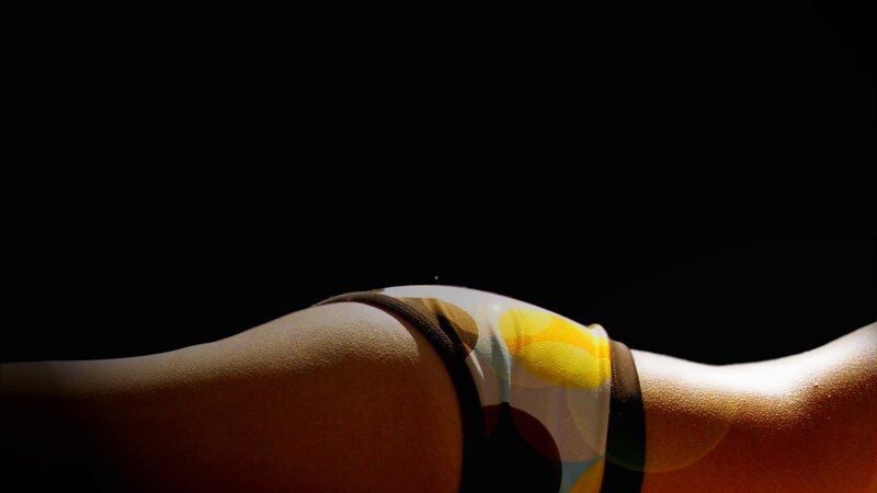 back view of a person in patterned underwear